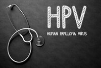 HPV og stetoskop på sort baggrund.