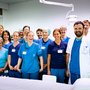 Glade medarbejdere fra Hjertesygdomme på Aarhus Universitetshospital, der har vundet behandlingsområdet PCI – en behandling, der kan fjerne forsnævringer i hjertets kranspulsårer. Foto: Tonny Foghmar